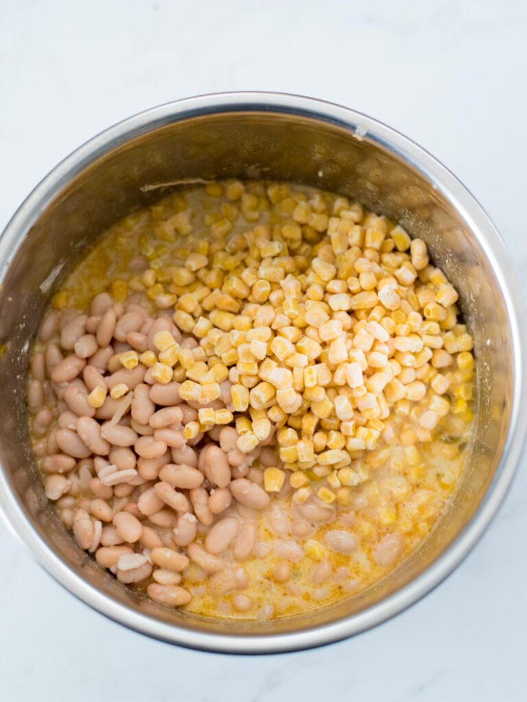 beans and corn added to an instant pot