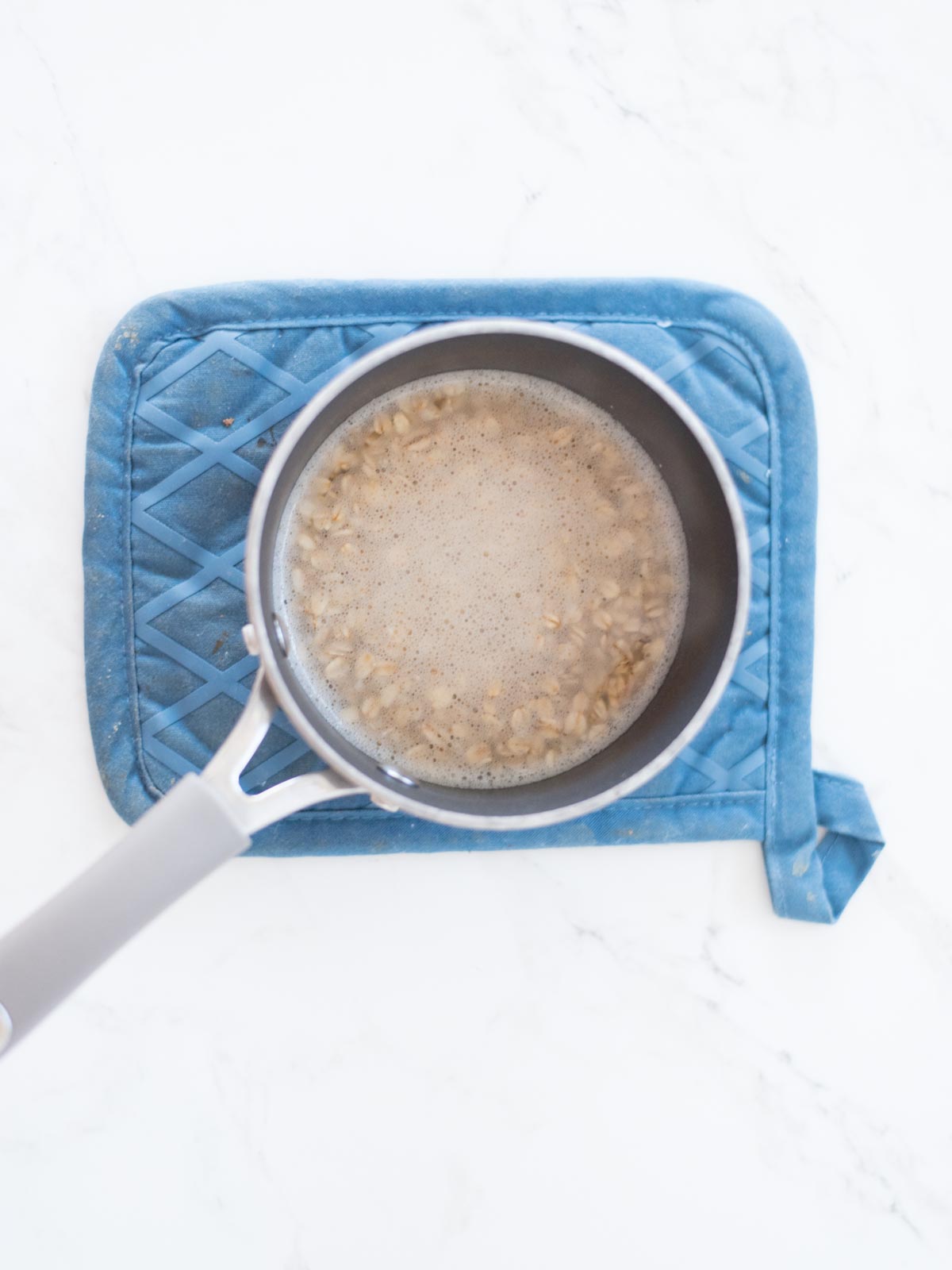 oatmeal and water in a saucepan