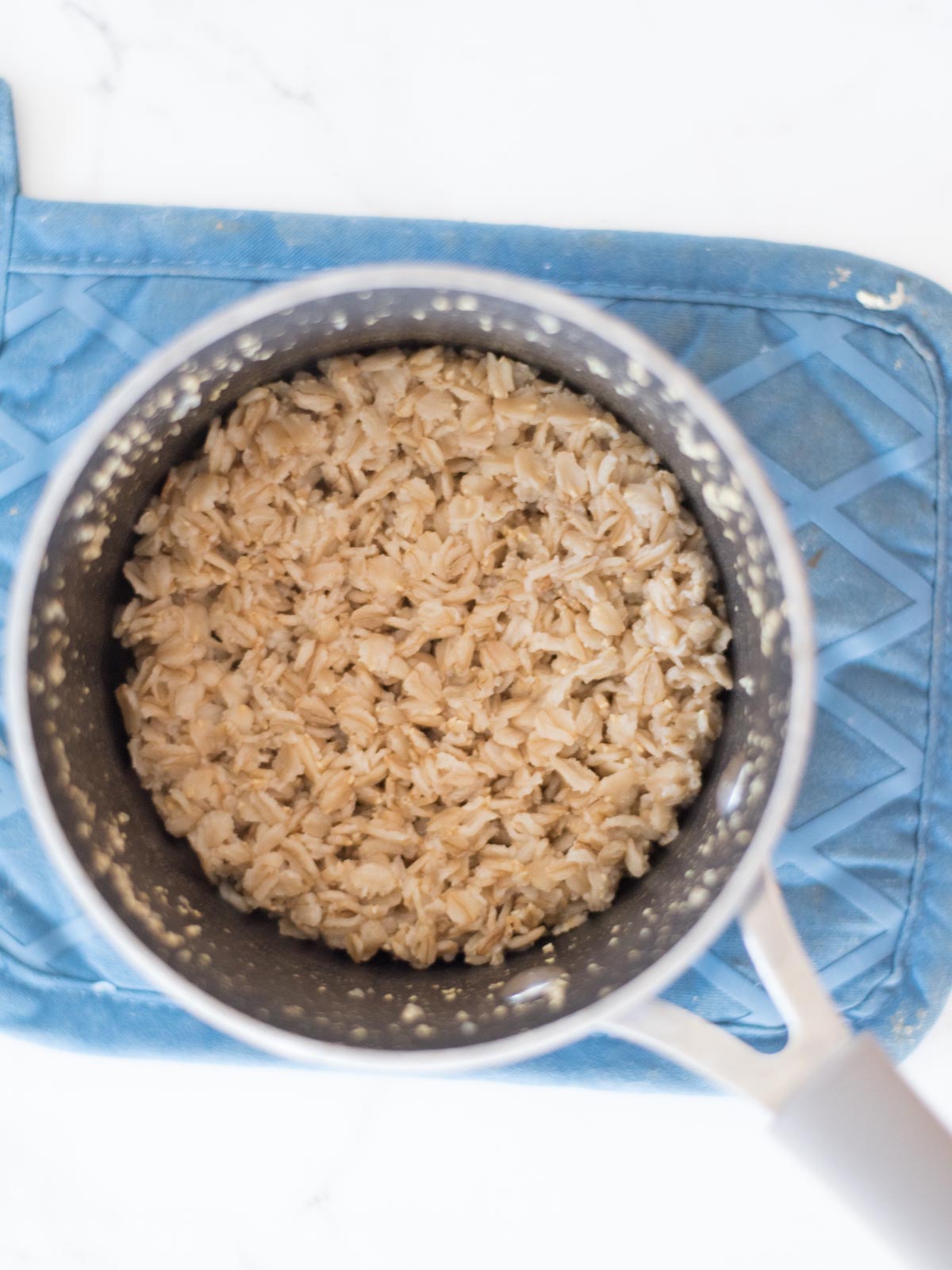 cooked oats in a saucepan