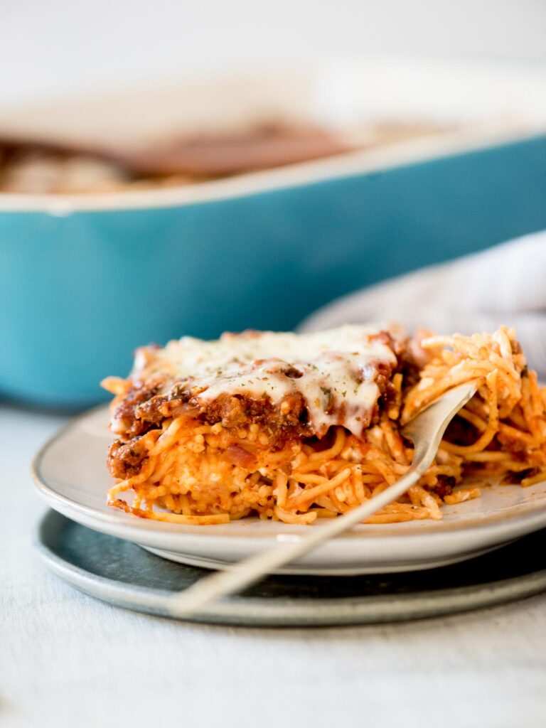easy baked spaghetti on a plate with a fork