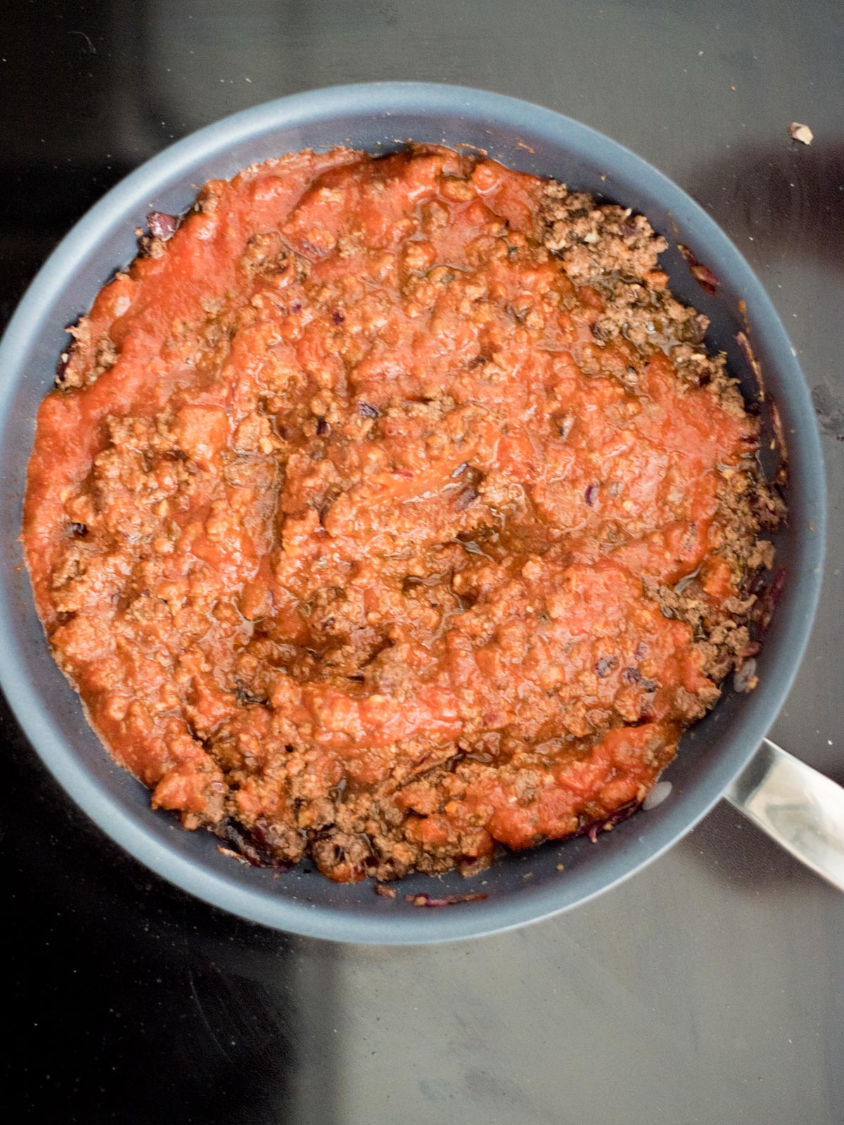 hearty meat sauce mixture in a skillet