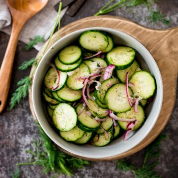 old fashioned cucumbers and onions in vinegar in a bowl