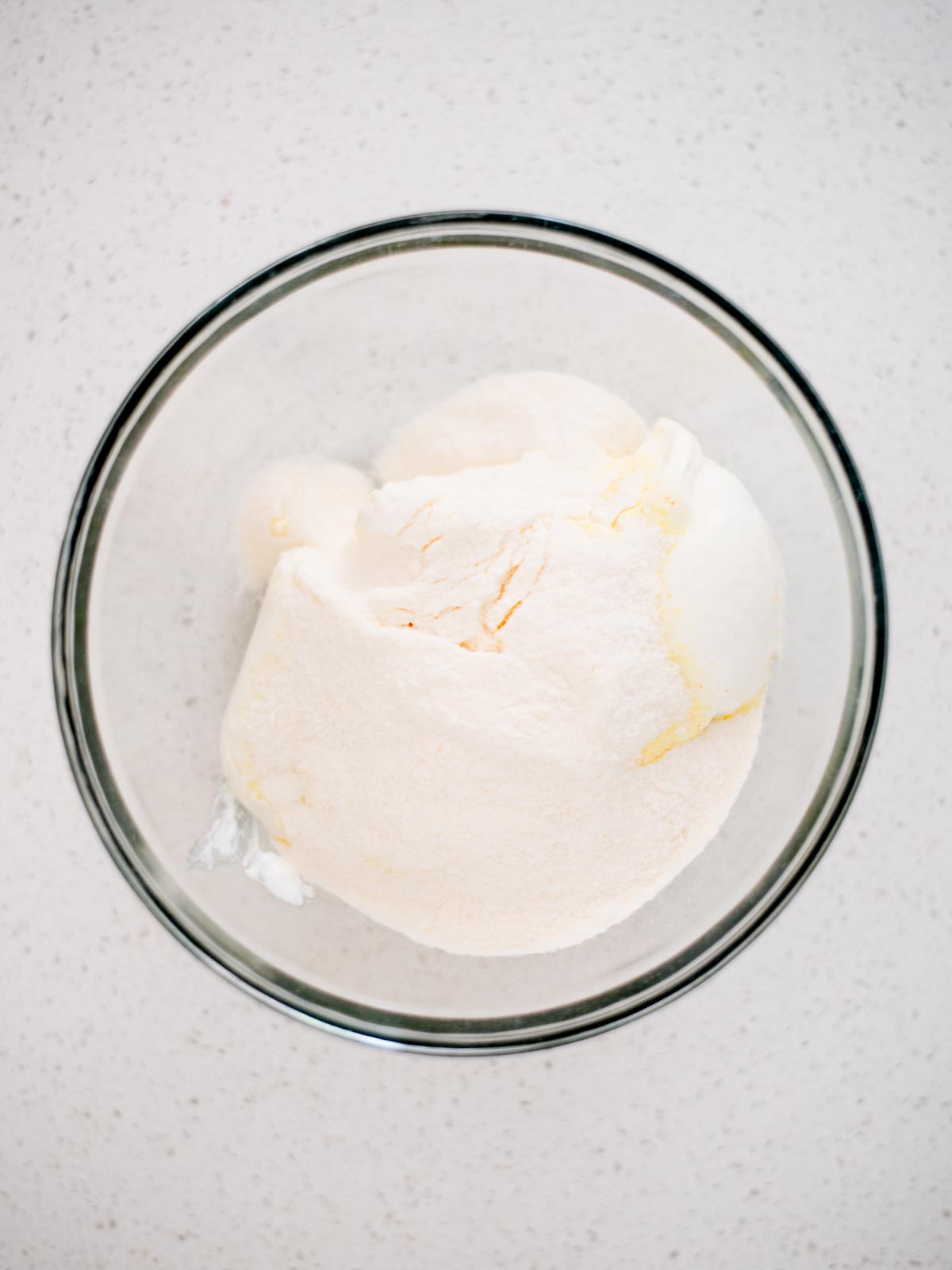 ingredients for yogurt fruit dip in a bowl