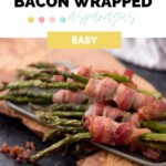 Platter of bacon wrapped asapargus with crispy bacon pieces around the edge with text overlay air fryer bacon wrapped asparagus easy.