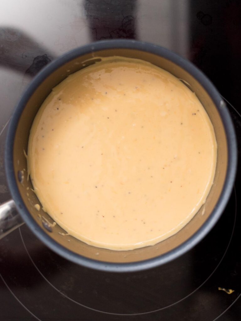 Cheese sauce in a saucepan.