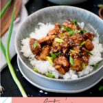 bowl of general tso served over white rice