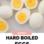 Whole and halved hard boiled eggs with the text overlay perfect hard boiled eggs every time.