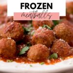 Bowl of meatballs in tomato sauce with text overlay instant pot frozen meatballs.