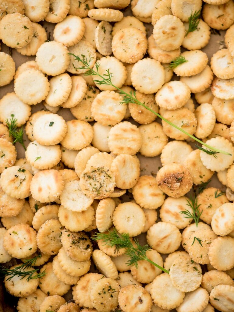 seasoned oyster crackers with fresh dill sprinkled over the top.