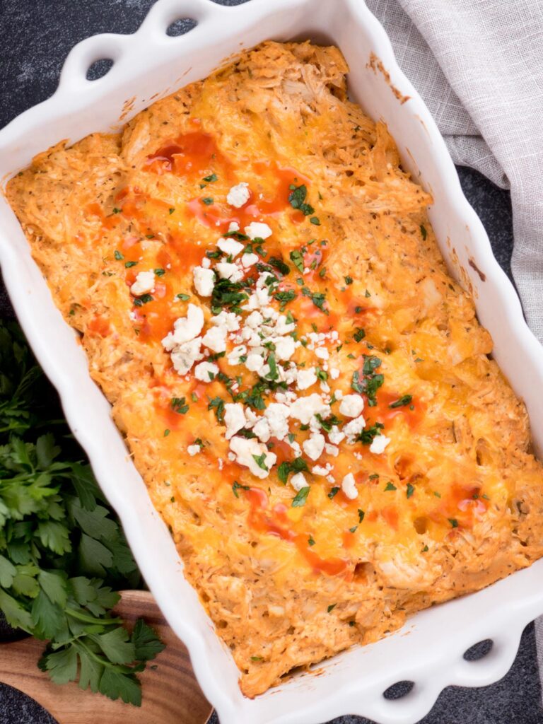 Top view of buffalo chicken dip in a baking dish.