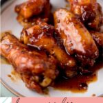 pinterest graphic of honey garlic chicken wings on a plate