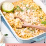 Pinterest image for mexican corn casserole with a wooden spoon tucked into it.