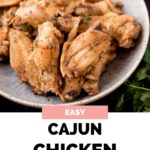 Pinterest image with text overlay easy cajun chicken with a bowl of wings.