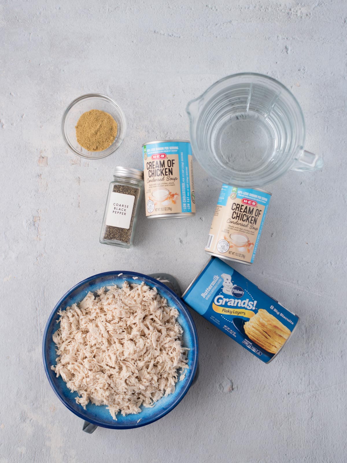 Ingredients needed to prepare chicken and biscuits with canned biscuits.