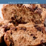 Close-up of sliced chocolate chip banana bread on a cooling rack, with visible chunks of chocolate and a moist texture. A blue banner above reads Chocolate Chip Banana Bread with the website sweetlysplendid.com.
