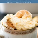 A close-up of a white mug filled with creamy southern banana pudding topped with vanilla wafers; text above reads southern BANANA PUDDING sweetlysplendid.com.