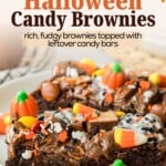 Brownies topped with various Halloween candies and sprinkles on a plate, under text reading Leftover Halloween Candy Brownies.
