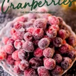 A white bowl piled with sugar-coated cranberries, with text overlay reading SUGARED Cranberries THE PERFECT HOLIDAY GARNISH.